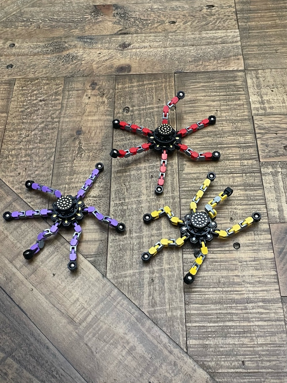 transformable fidget spinner robot toys featuring snap-and-shape  flexible arms